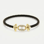 Bracciale in Metallo simil pelle intrecciata nero con chiusura gioiello dorata - BYSIMON gioielli
