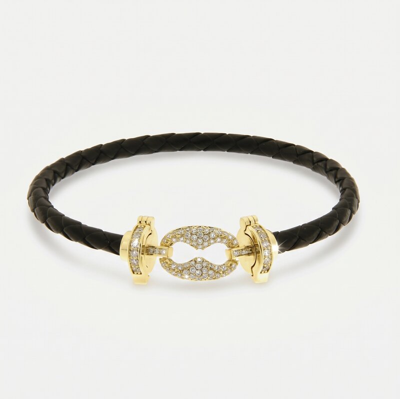 Bracciale in Metallo simil pelle intrecciata nero con chiusura gioiello dorata - BYSIMON gioielli