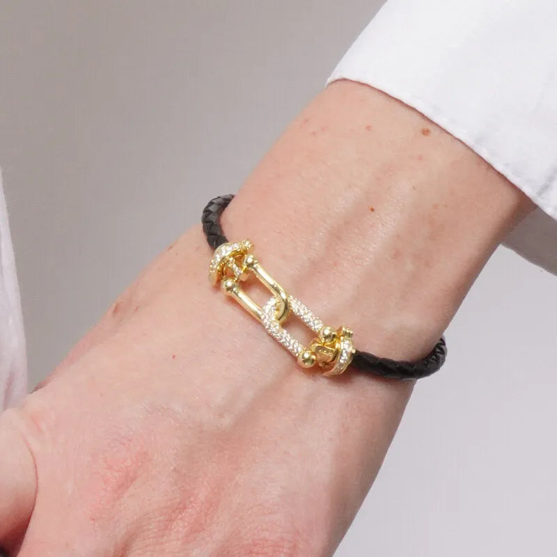 Bracciale in Metallo simil pelle intrecciata nero con chiusura gioiello dorata