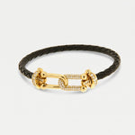 Bracciale in Metallo simil pelle intrecciata nero con chiusura gioiello dorata - BYSIMON gioielli