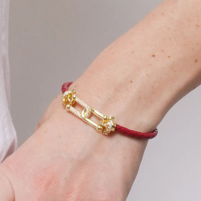 Bracciale in Metallo simil pelle intrecciata rosso con chiusura gioiello dorata