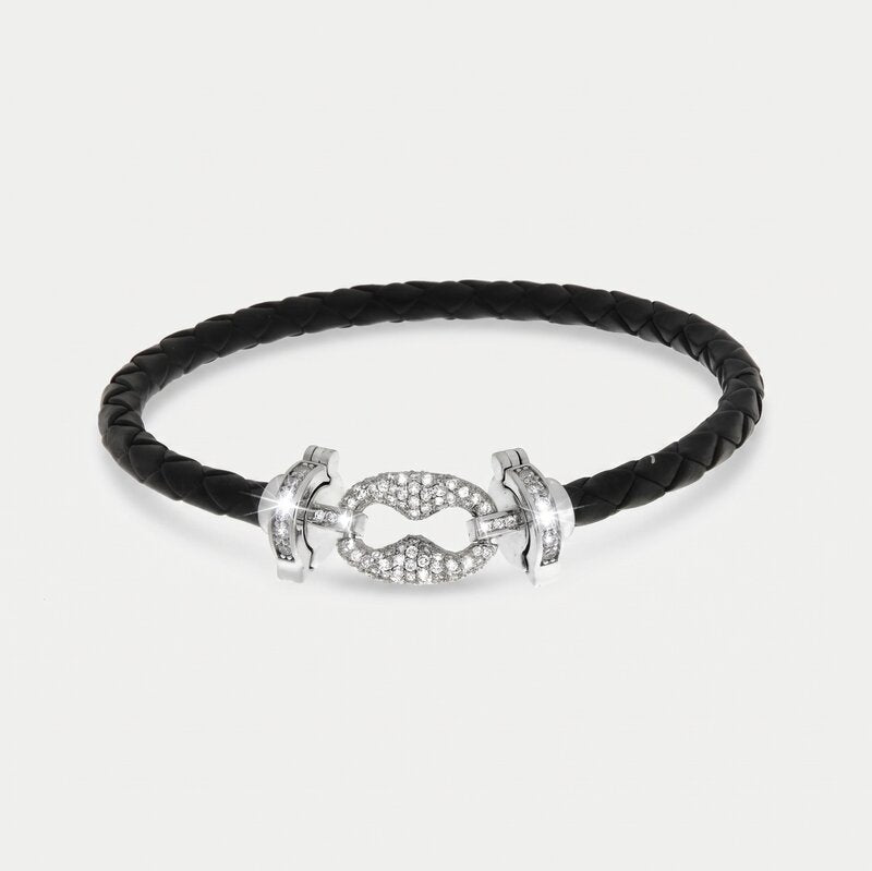 Bracciale in Metallo simil pelle intrecciata nero con chiusura gioiello argentata - BYSIMON gioielli