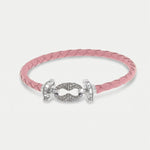 Bracciale in Metallo simil pelle intrecciata rosa con chiusura gioiello argentata - BYSIMON gioielli