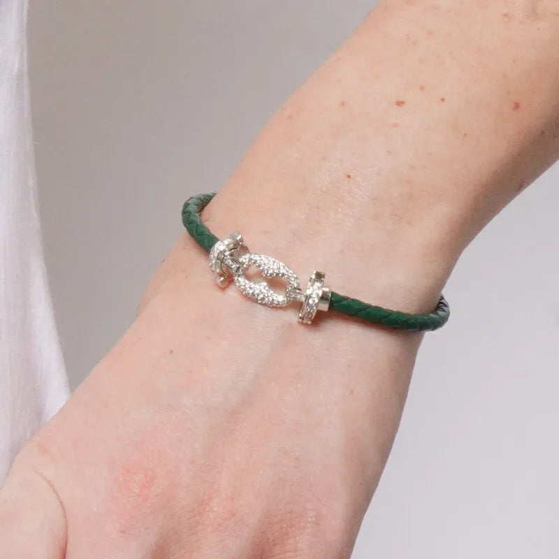 Bracciale in Metallo simil pelle intrecciata verde con chiusura gioiello argentata