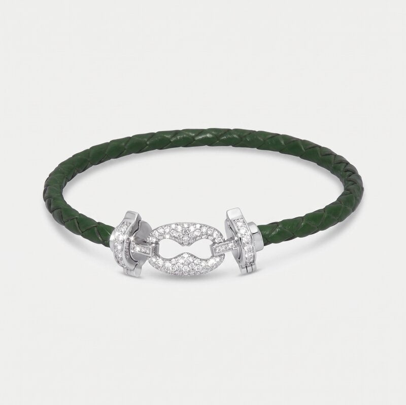 Bracciale in Metallo simil pelle intrecciata verde con chiusura gioiello argentata - BYSIMON gioielli