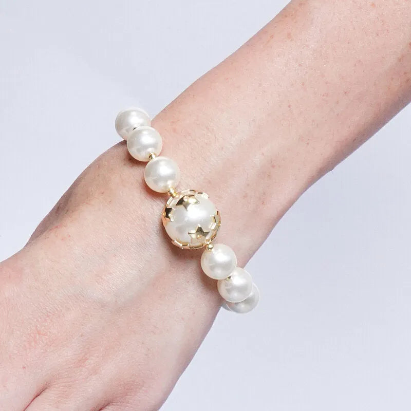 Bracciale in Metallo perla e stelle dorate