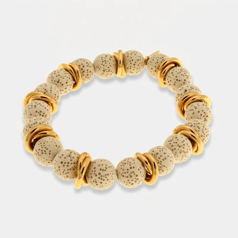 Bracciale in Metallo elastico con sfere laviche bianche
