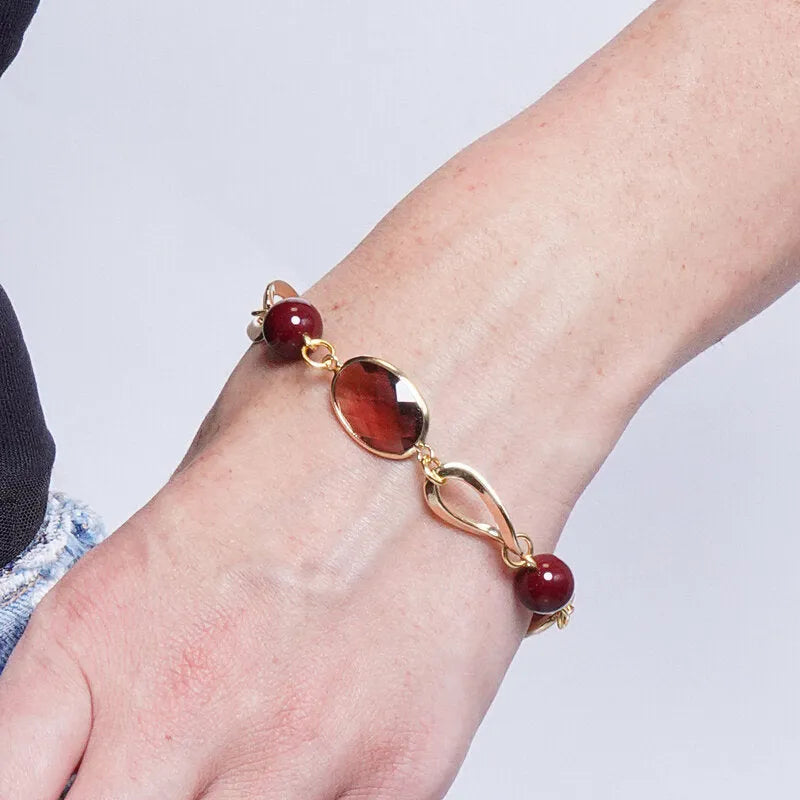 Bracciale in Metallo cristalli marroni elementi dorati