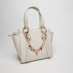 Set coordinato - Accessorio borsa in Metallo camapanelle Capri rosa e cuori