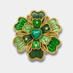 Spilla in Metallo magnetica motivo a fiore smaltato verde con pietra cuore centrale