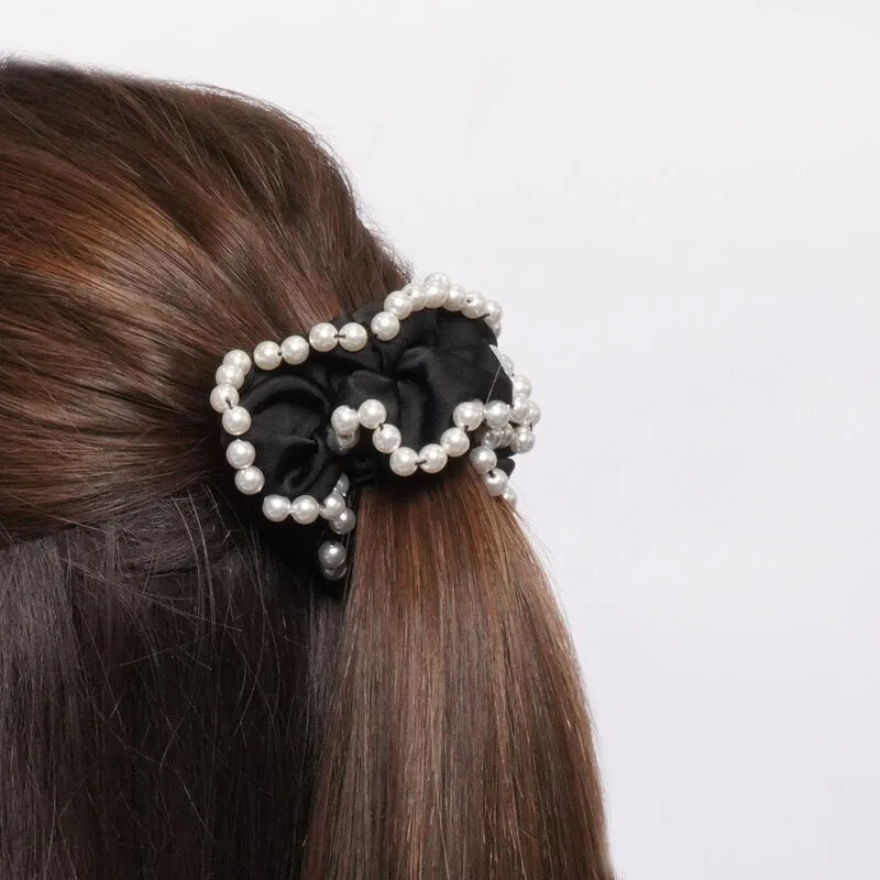 Black ponytail with rhinestones