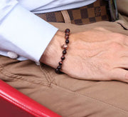 Bracciale in Acciaio con teschio centrale con zirconi neri e pietre marroni