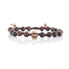 Bracciale in Acciaio con teschio centrale con zirconi neri e pietre marroni