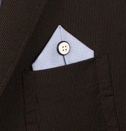 Spilla in Metallo a forma di bottone, impreziosito da smalto nero e bianco