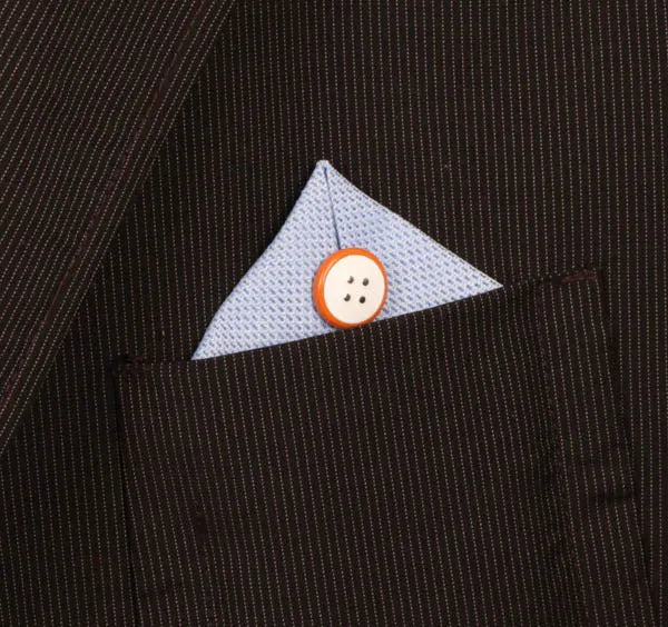 Spilla in Metallo a forma di bottone, impreziosito da smalto arancio e bianco