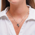 Collana in Acciaio con campanella portafortuna, impreziosita da punto luce - BYSIMON gioielli