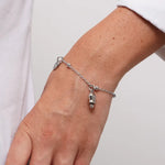 Bracciale in Acciaio con campanella portafortuna pendente - BYSIMON gioielli