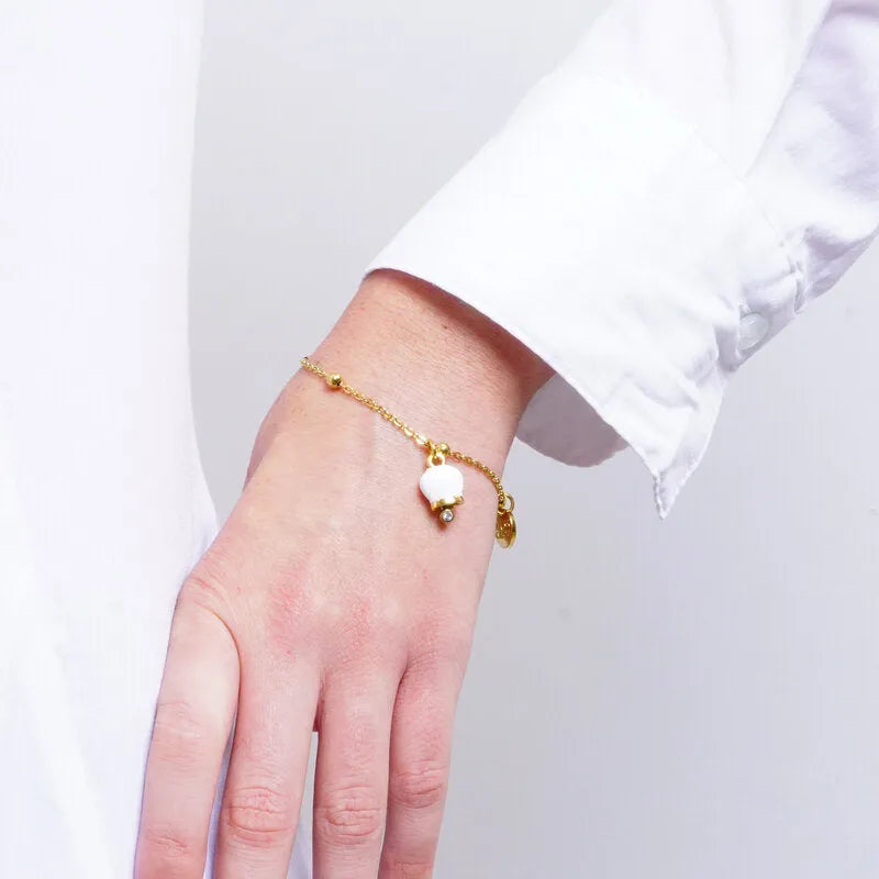 Bracciale in Acciaio campanella portafortuna bianca e oro - BYSIMON gioielli