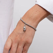 Bracciale in Acciaio maglia a sfere con campanella portafortuna