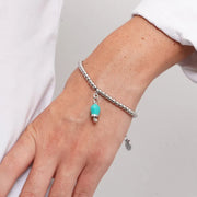 Bracciale in Acciaio maglia a sfere con campanella portafortuna verde acqua