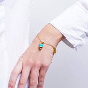 Bracciale in Acciaio con campanella portafortuna  verde acqua