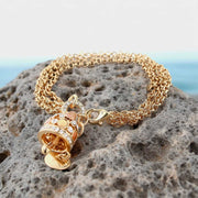 Bracciale in Metallo catena multifilo, con campana pendente impreziosita da cristalli colorati e punti luce bianchi