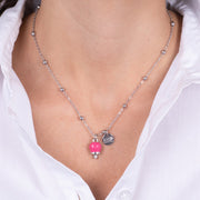 Metal necklace with pendant lucky bell, embellished with enamel and crystals