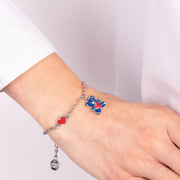 Metal bracelet with blue teddy bear and red heart