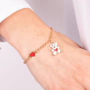 Metal bracelet with white teddy bear and red heart