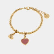 Metal bracelet with pink heart