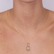 Collana in Argento 925  con cerchi pendenti impreziositi da un cristallo bianco centrale