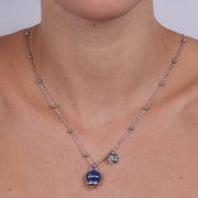 Collana in Metallo con campanella portafortuna pendente impreziosita da smalto blu e cristalli
