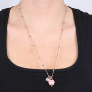 Collana in Metallo con campanella portafortuna pendente, impreziosita da smalto rosa e cristalli
