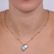 Collana in Metallo con campanella portafortuna pendente, impreziosita da smalto turchese e cristalli