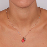 Collana in Metallo con campanella portafortuna pendente, impreziosita da smalto rosso e cristalli