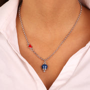 Collana in Metallo con cuore rosso e campanella portafortuna pendente blu, impreziosita da punto luce