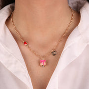 Collana in Metallo con campanella rosa e fiocco centrale con cuore pendente