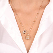 Collana in Metallo campanella portafortuna in smalto caffè, con scritta Capri a rilievo e cristalli bianchi