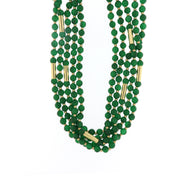 Multi-strand metal necklace with green stones