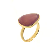 Metal ring with amaranth-colored stone