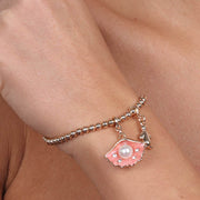 Bracciale in Metallo con ciondolo conchiglia pendente, impreziosita da smalto rosa e perla