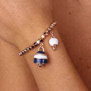Bracciale in Metallo con doppia campana pendente impreziosita da smalto bianco, blu e cristalli