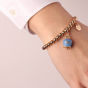 Bracciale in Metallo con campanella portafortuna blu cobalto, con scritta Capri