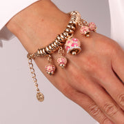 Bracciale in Metallo con campanelle colorate in smalto rosa e cristalli bianchi