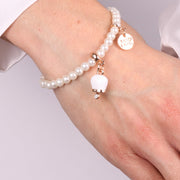 Bracciale in Metallo Bracciale in Metallo con perle e campanella portafortuna in smalto bianco