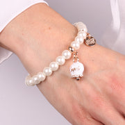 Bracciale in Metallo Bracciale in Metallo con perle e campanella portafortuna in smalto bianco con scritta Capri