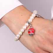 Bracciale in Metallo Bracciale in Metallo con perle e campanella portafortuna in smalto rosso con scritta Capri