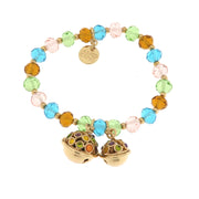 Metal bracelet with rattles and colored stones