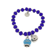 Metal bracelet with blue bell and small rattle with blue stones