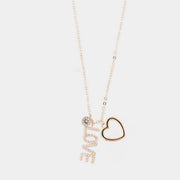 Collana in Argento 925 con cuore liscio pendente e scritta love arricchita da zirconi binchi e piccolo punto luce